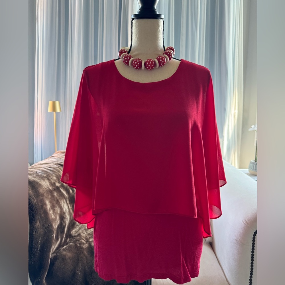 Peter Nygard top
